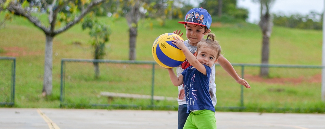 Photo of the Week - Camille Sports between siblings
